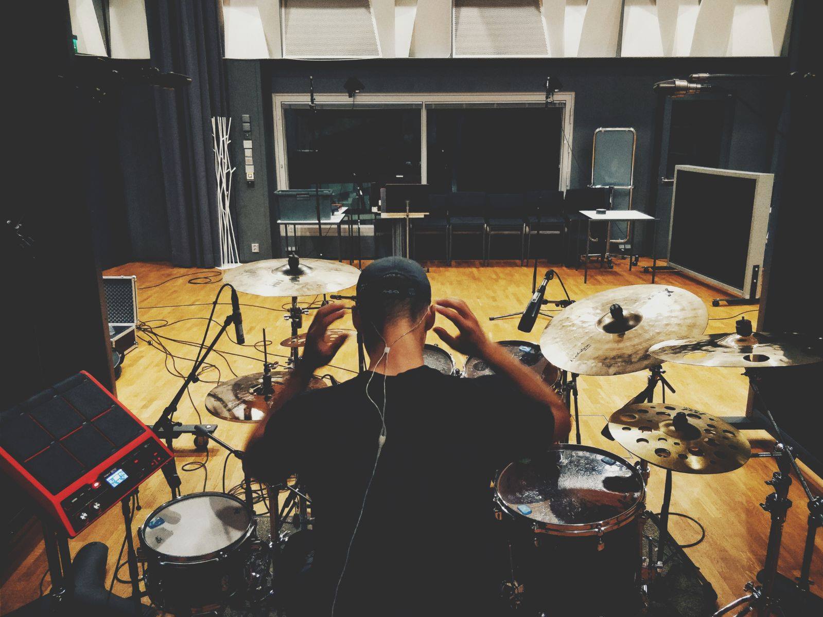 Preparing for a drum recording session. Drummer pictured: Mikael Marin